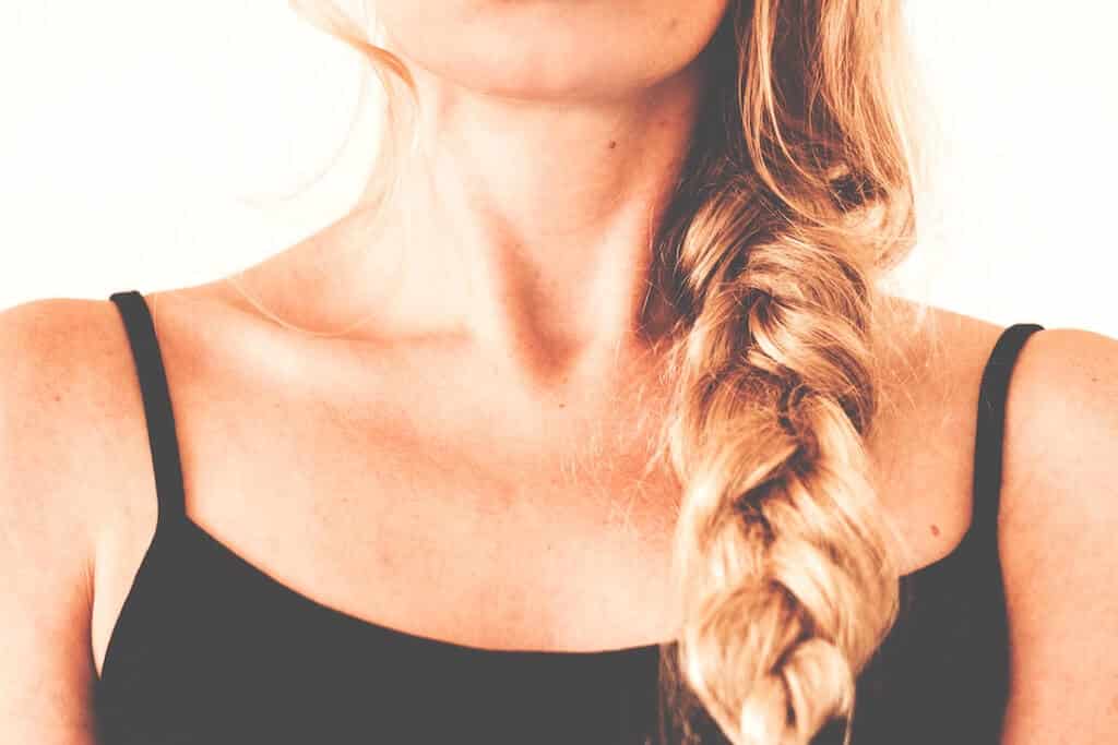 Photo of a woman with a long blonde braid